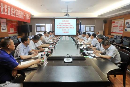 卧龙控股集团董事、卧龙电气驱动集团总经理、卧龙电驱全球销售总部总裁庞欣元一行来佰利乐座谈互换